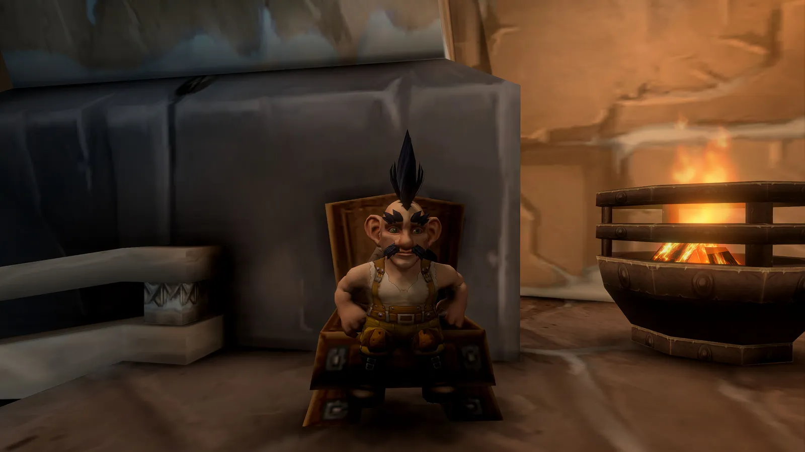 Stubz Flux sitting in a chair beside a glowing iron fire basket